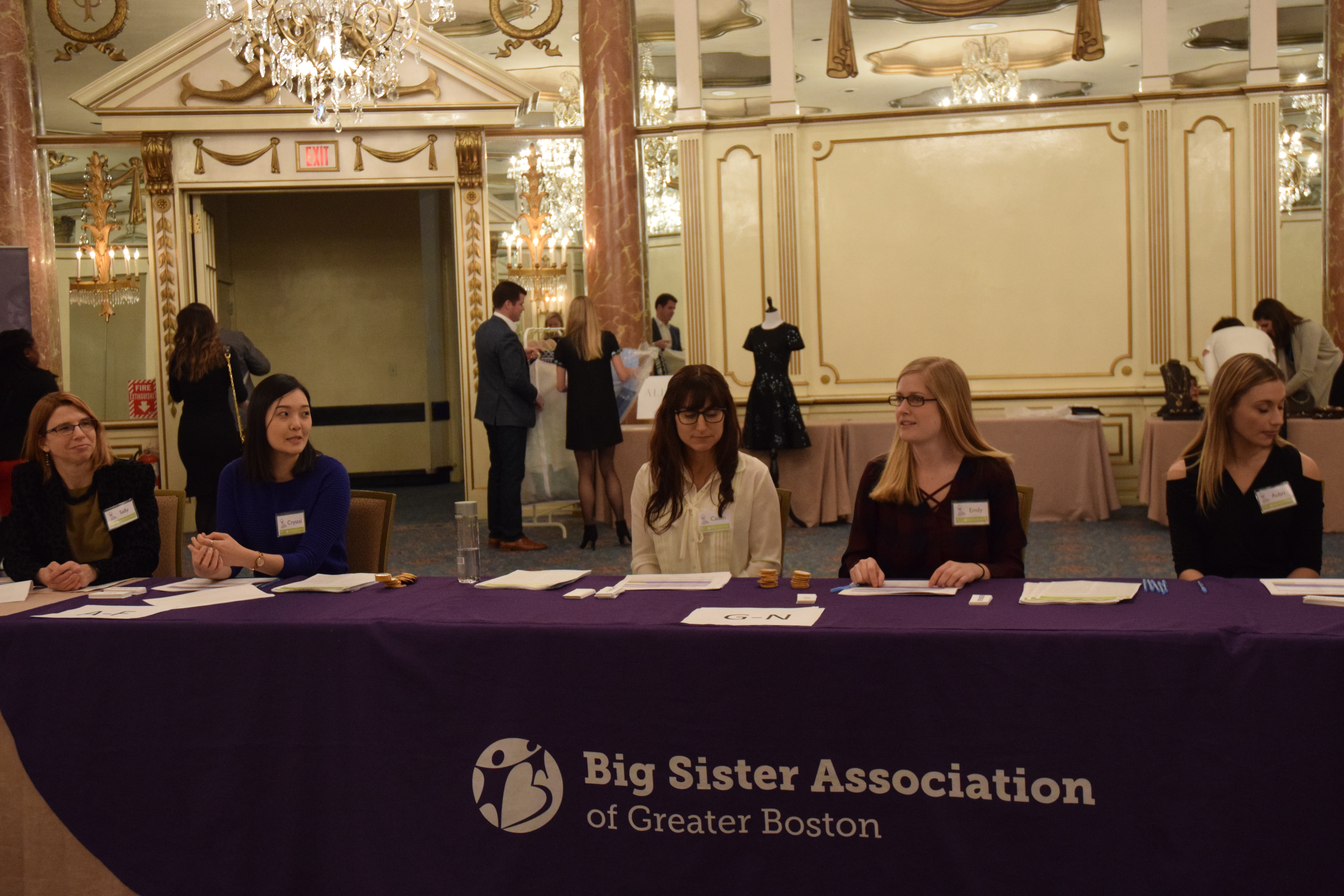 Coordinators wait on attendees to arrive. Taken by Temi Adeleye.