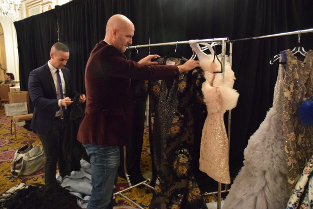 Michael DePaulo and his husband arranging the wardrobe for the show. Taken by Temi Adeleye.